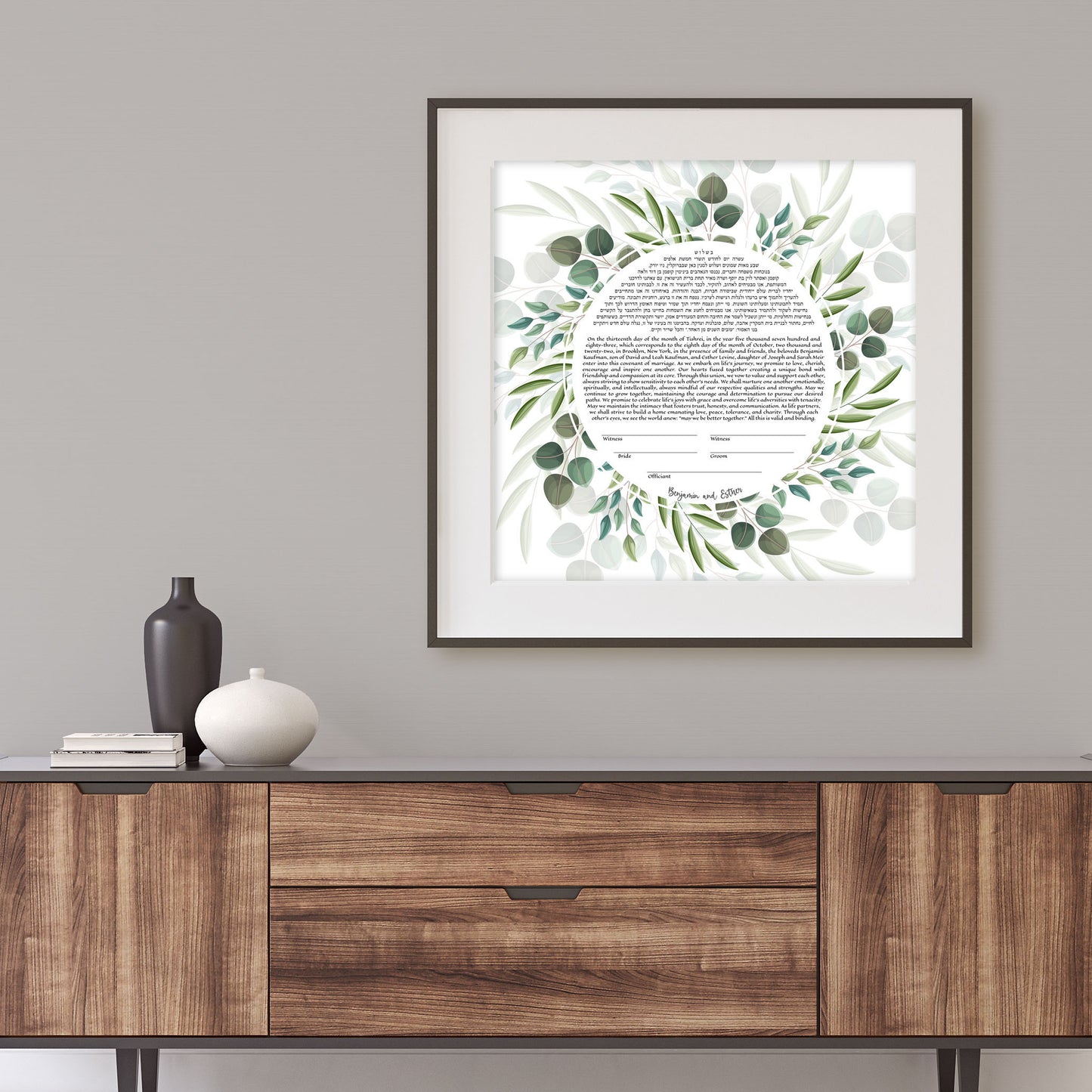 Botanical floral wreath ketubah displayed in the living room.