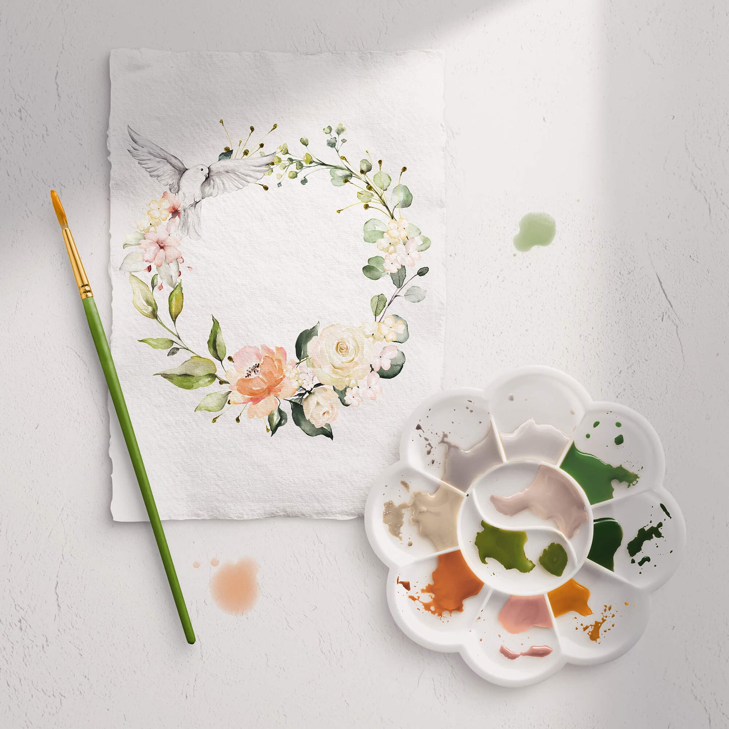 Artwork in progress showing how the watercolor floral wreath ketubah was created.