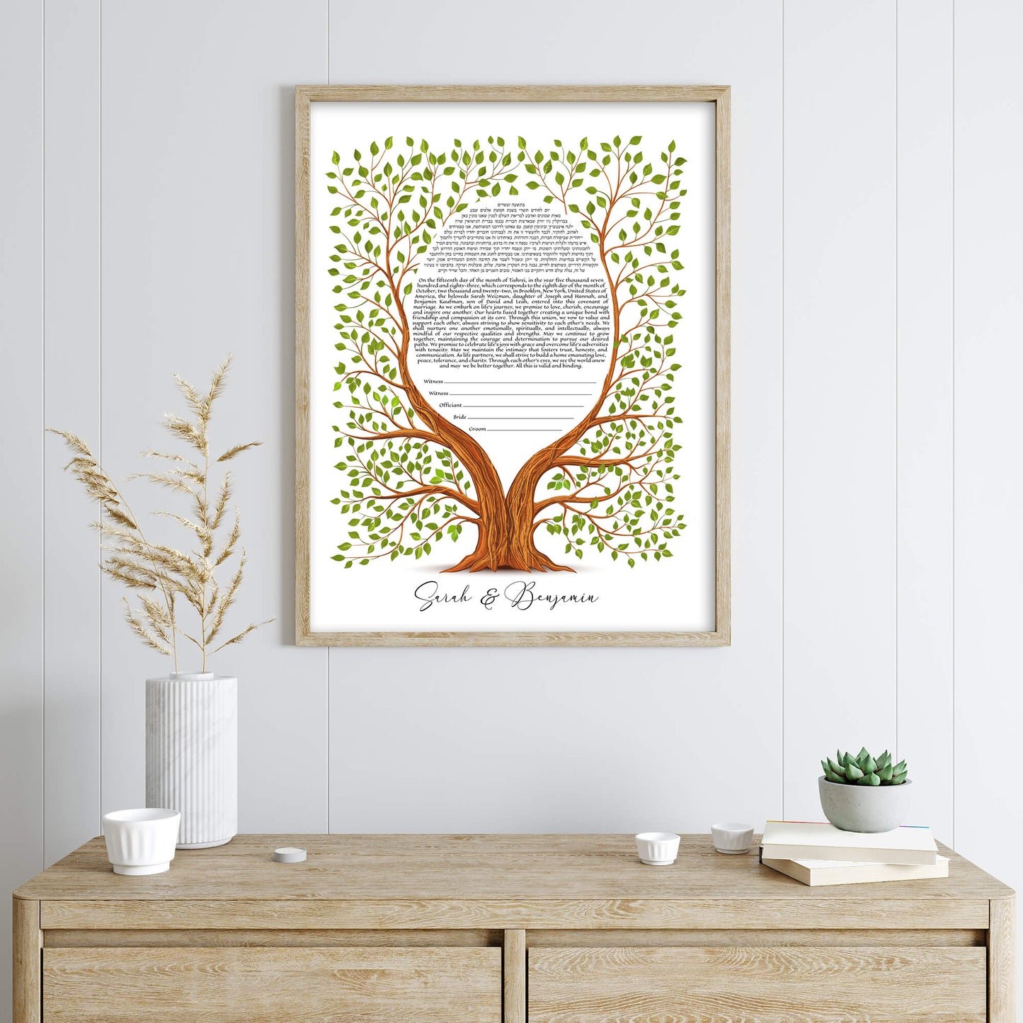 Tree of life ketubah on a gray wall.